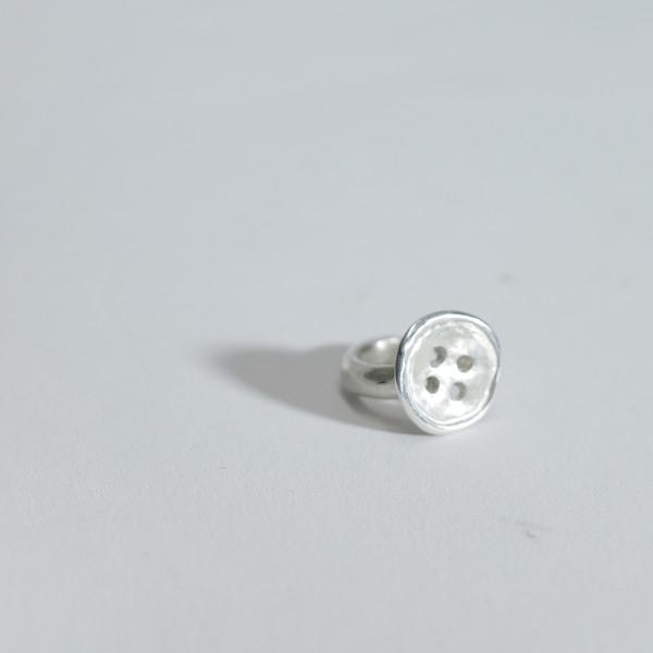 Button earcuff
