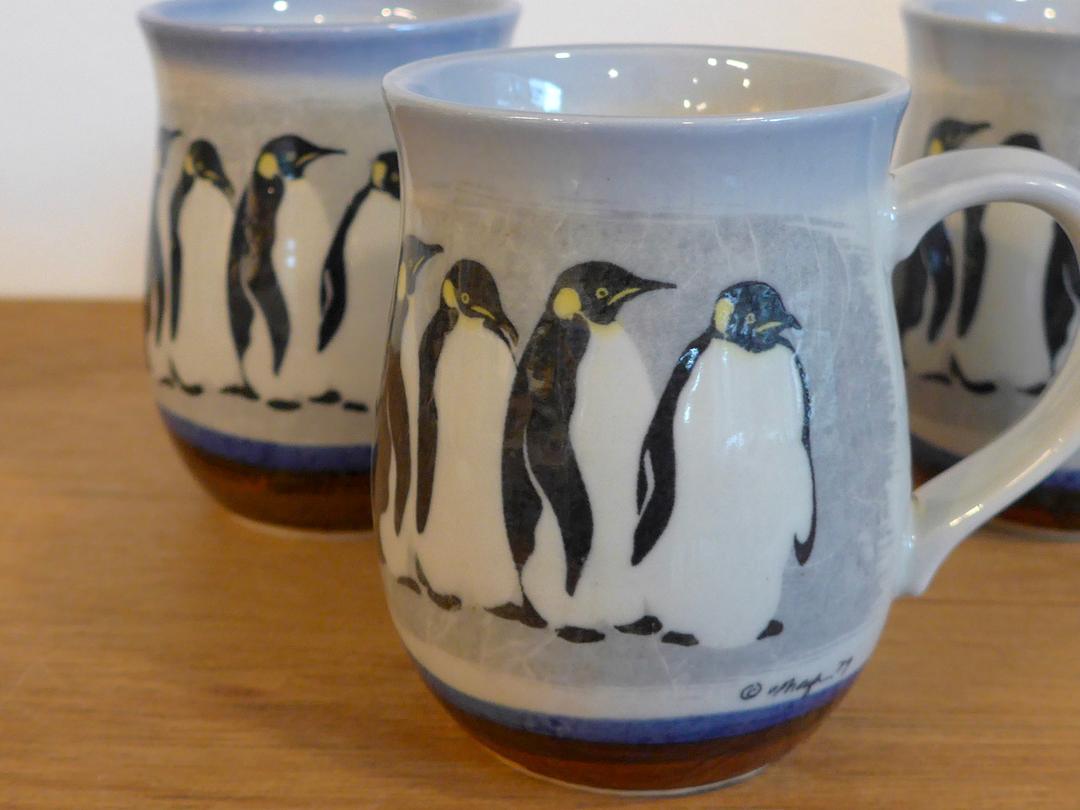 Four penguins mug
