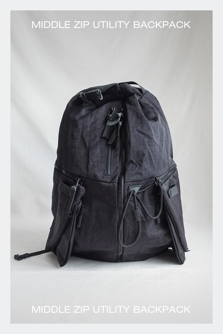 Middle zip utility backpack