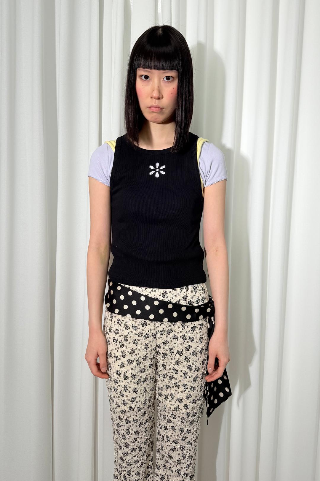 121. Petal Punch Sleeveless Top, Black