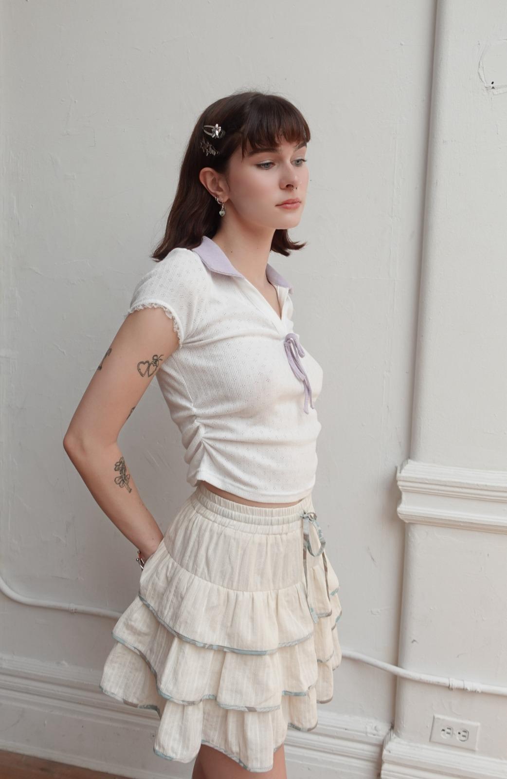 코튼) piped ruffle tier mini skirt-ivory/green