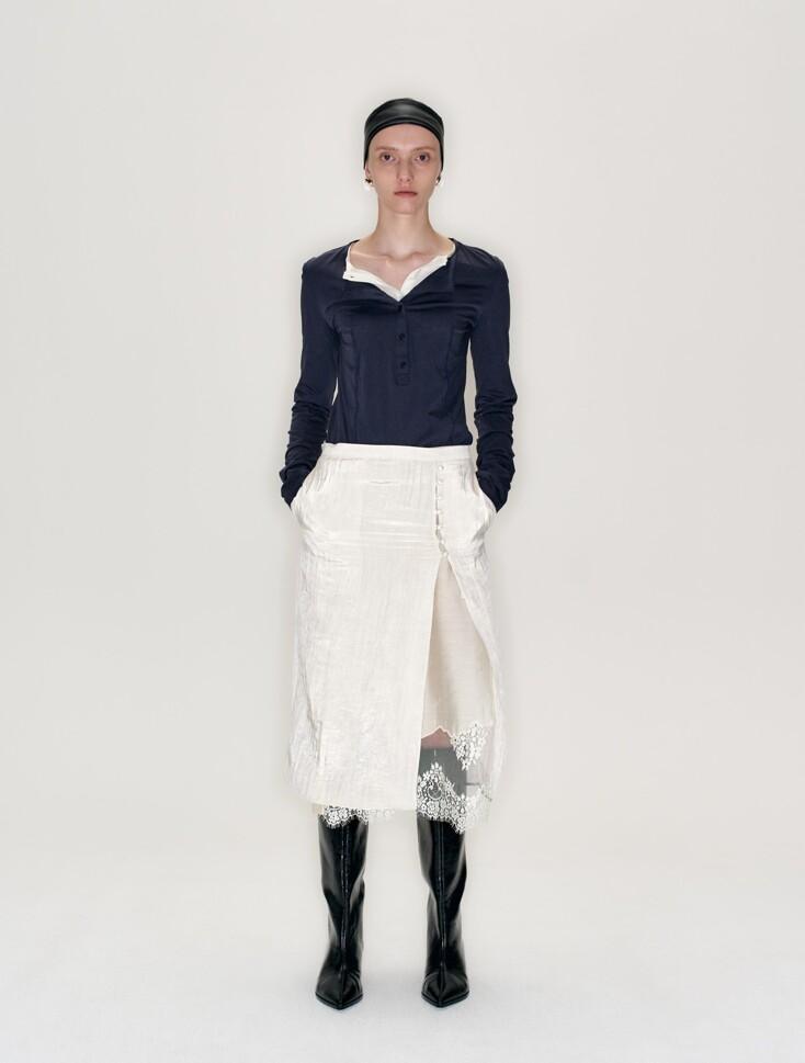SLIT DETAIL H LINE SKIRT IVORY (S25SK6081IV)