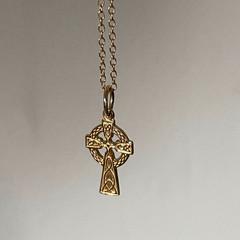 RINGED CROSS NECKLACE