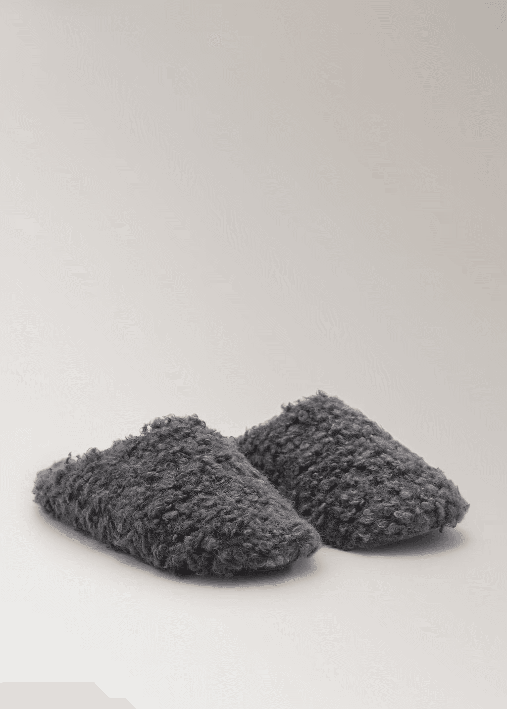 Pantoufles effet mouton retourné