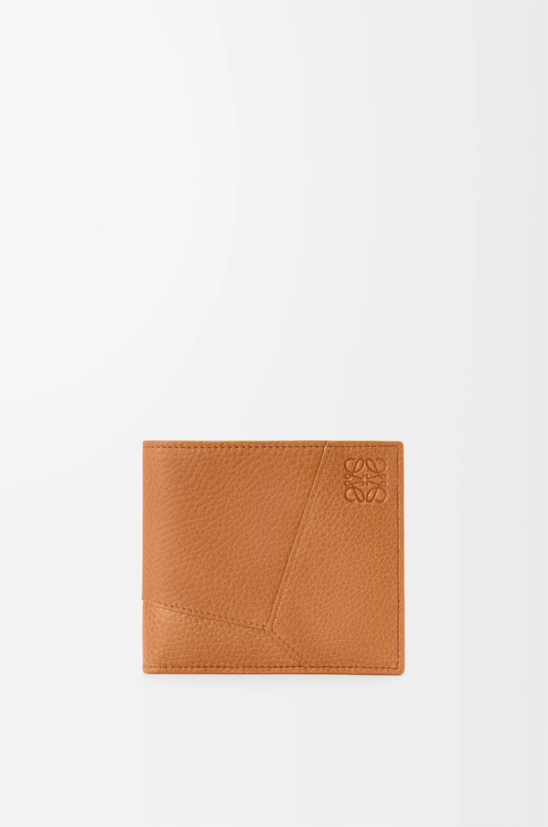 Puzzle bifold wallet in supple grained calfskin
