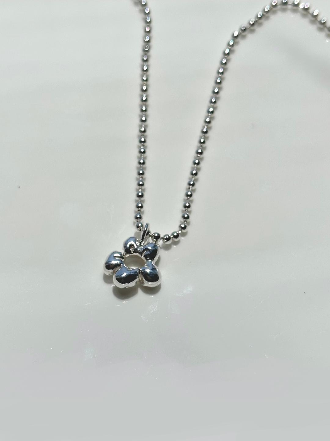 ugly flower necklace