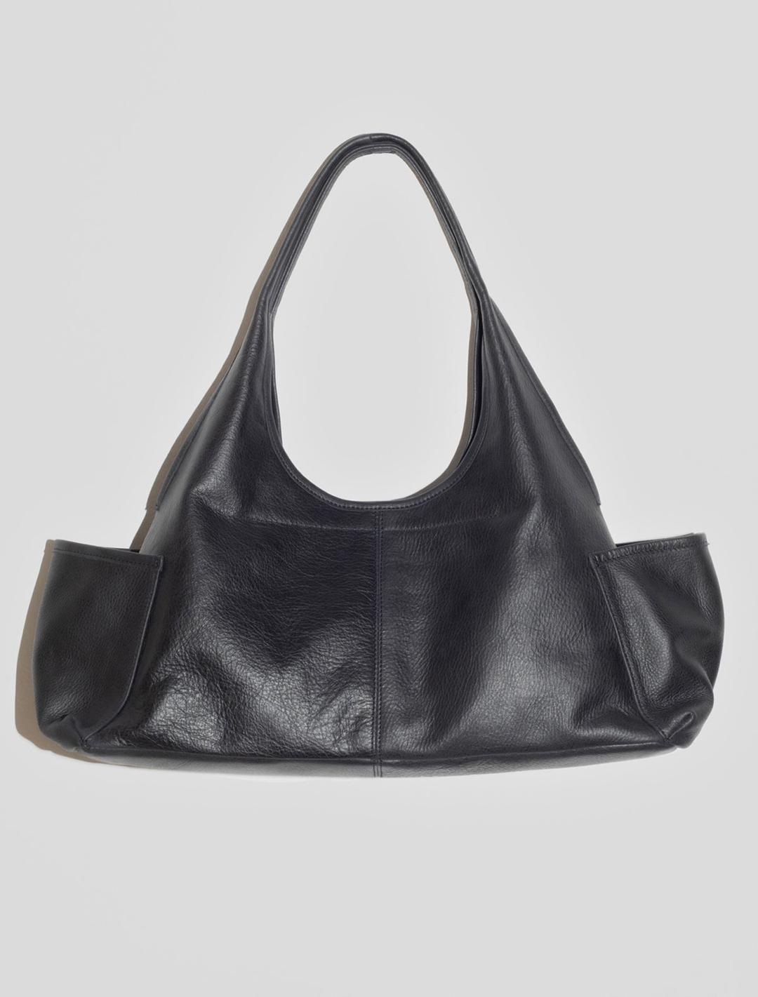 QUERIDA POCKETS-Triangular-shaped shoulder bag. Fit for laptops