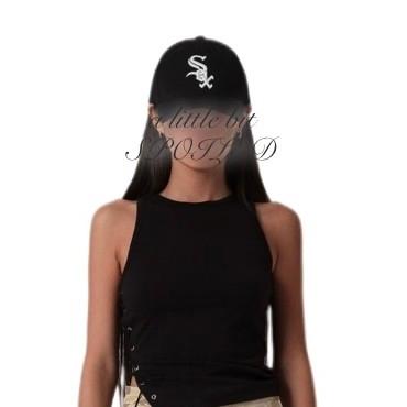 Side Eyelet Top In Black