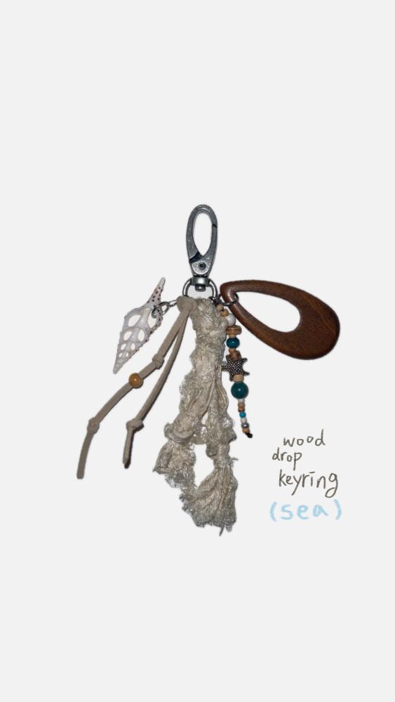 wood drop keyring sea