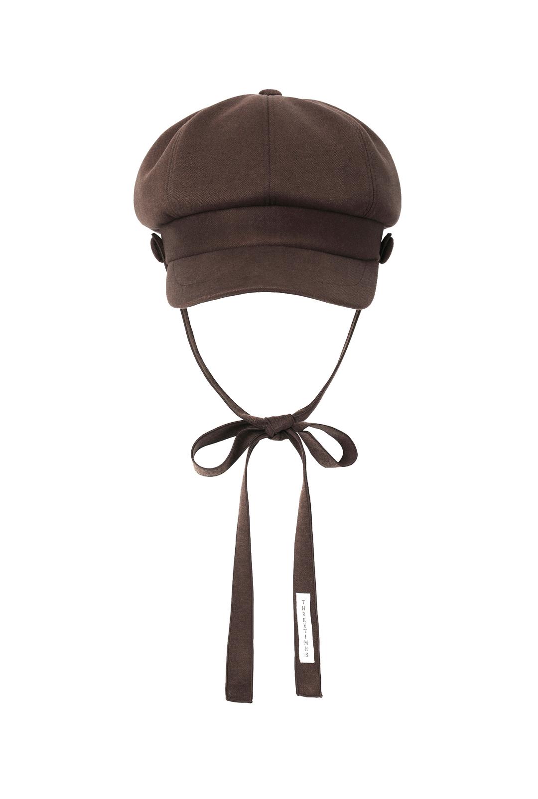 Strap newsboy cap