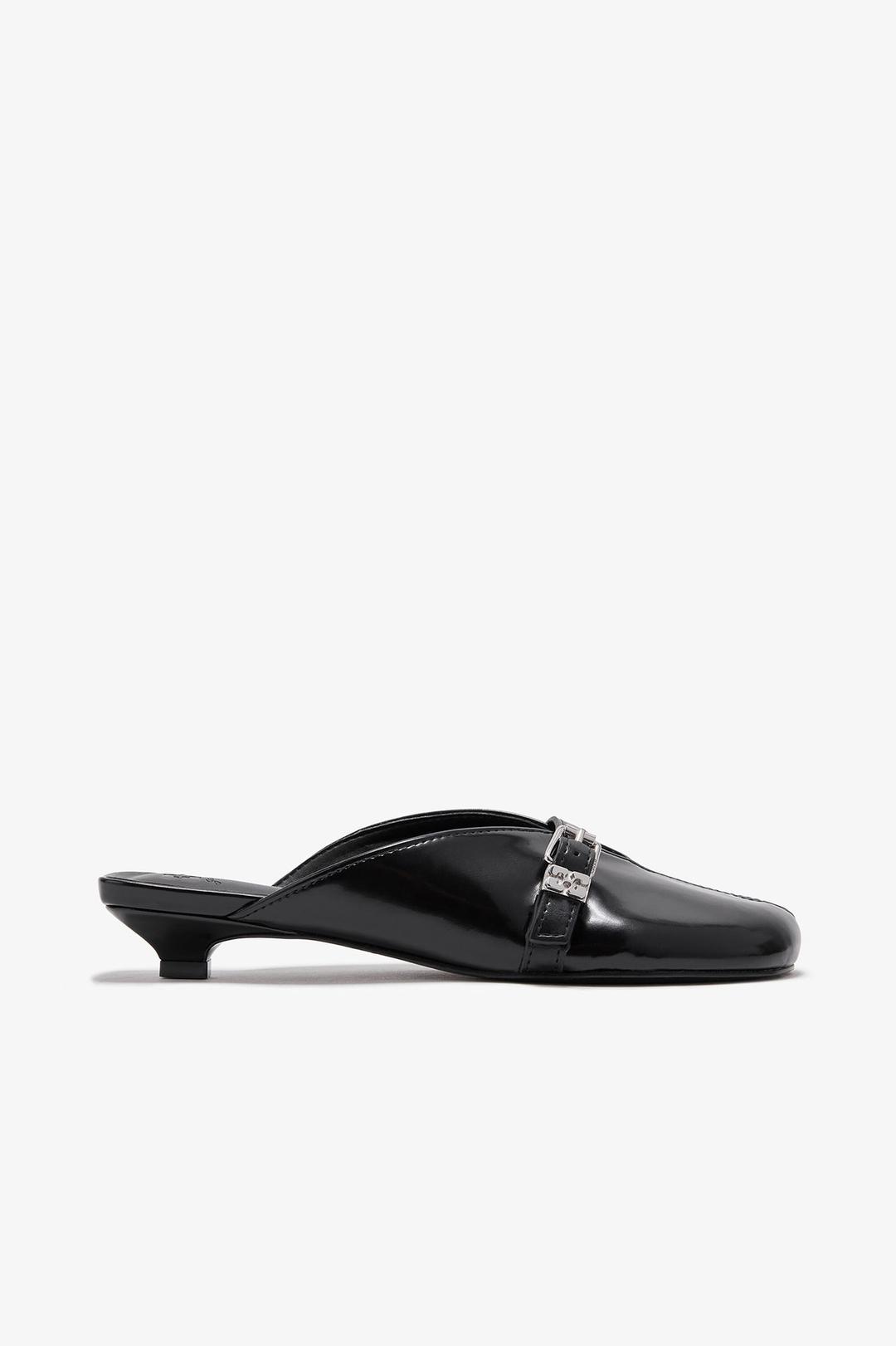 Sue-Mules mit Kitten-Heel in Schwarz