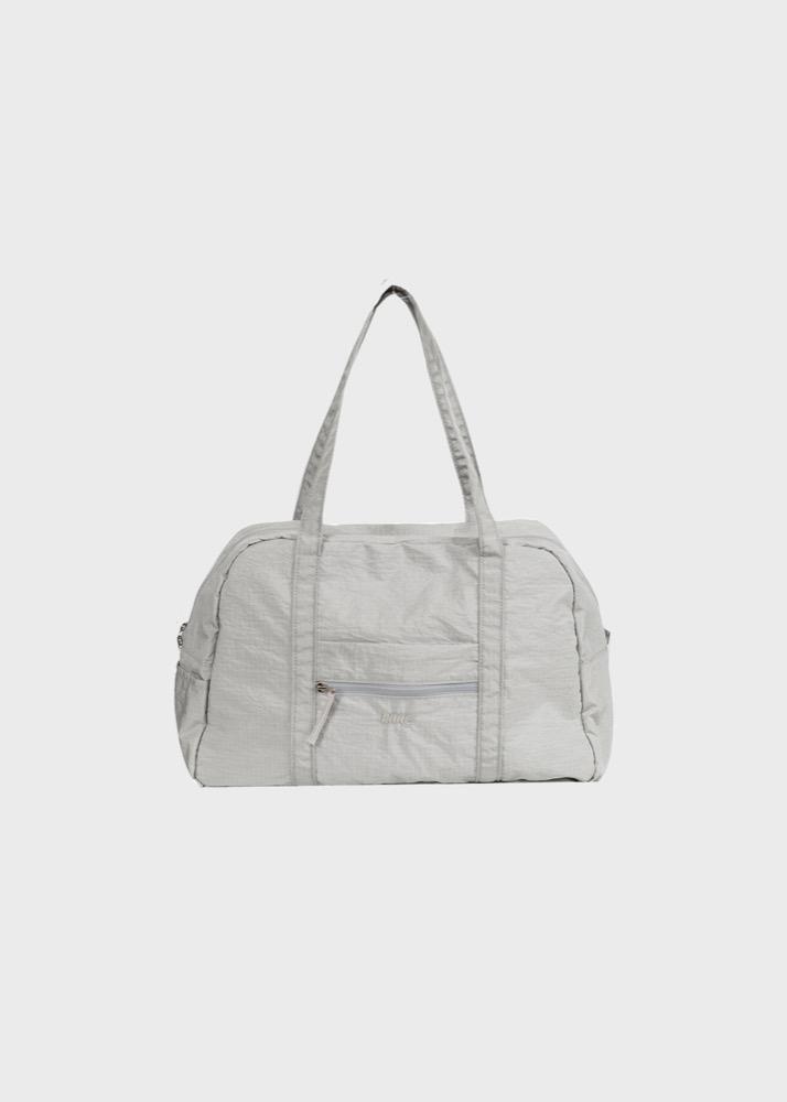 2nd) a duffel bag (silver)