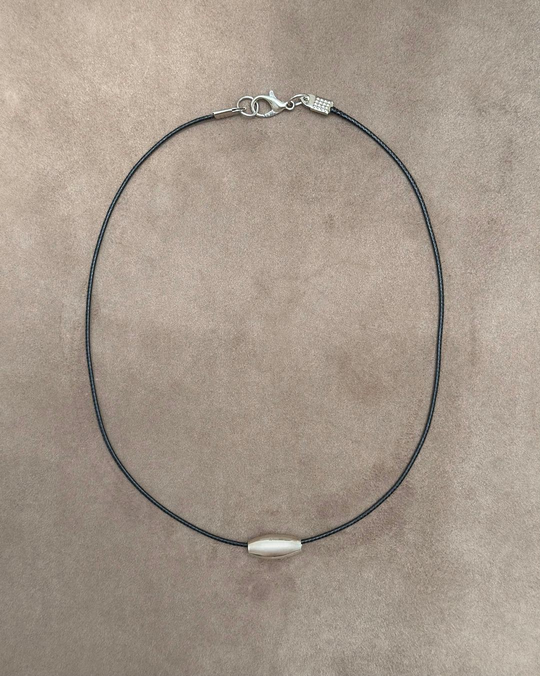TINY SILVER BEAN CORD NECKLACE