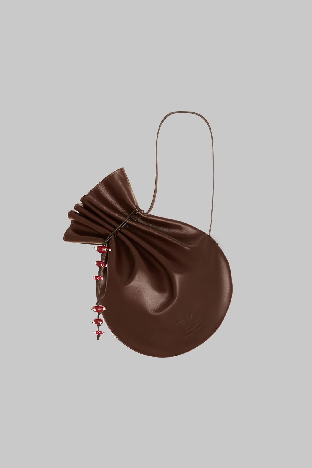 KOZMUNCHOQ LEATHER SHOULDER BAG