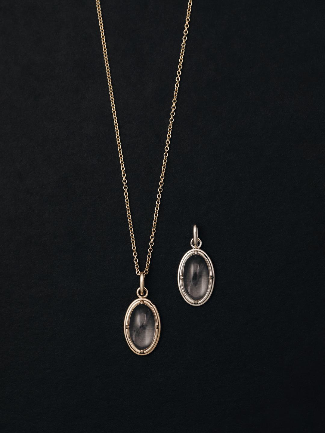 double bezel pendant +round 02 chain. -clear quartz
