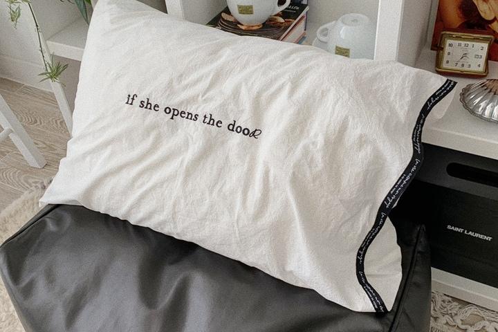 if she lettering pillow cover (black)