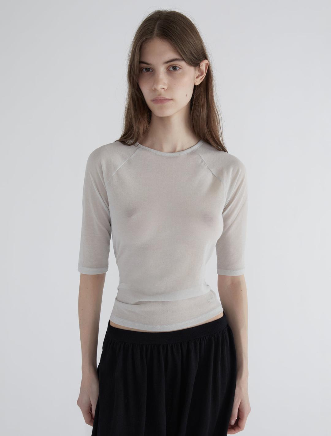 PIA-Grey elbow-length top crafted from lightweight, slightly sheer fabric