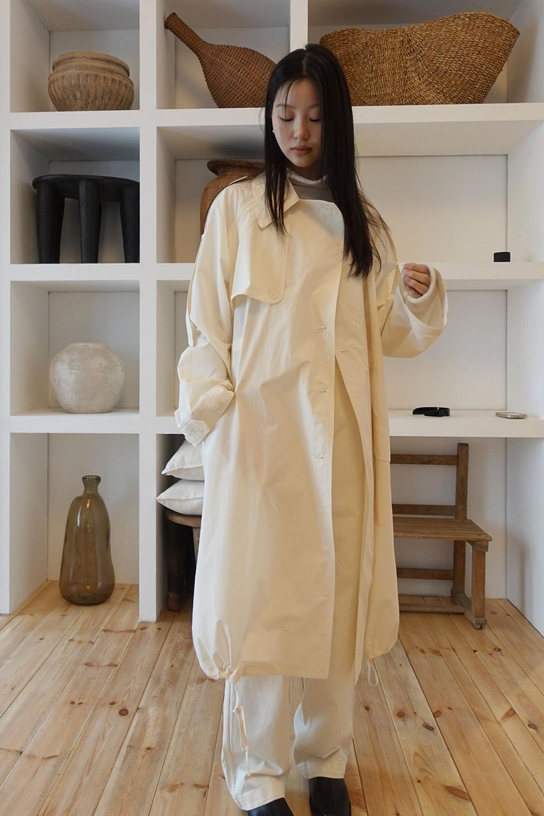 Butter trench coat