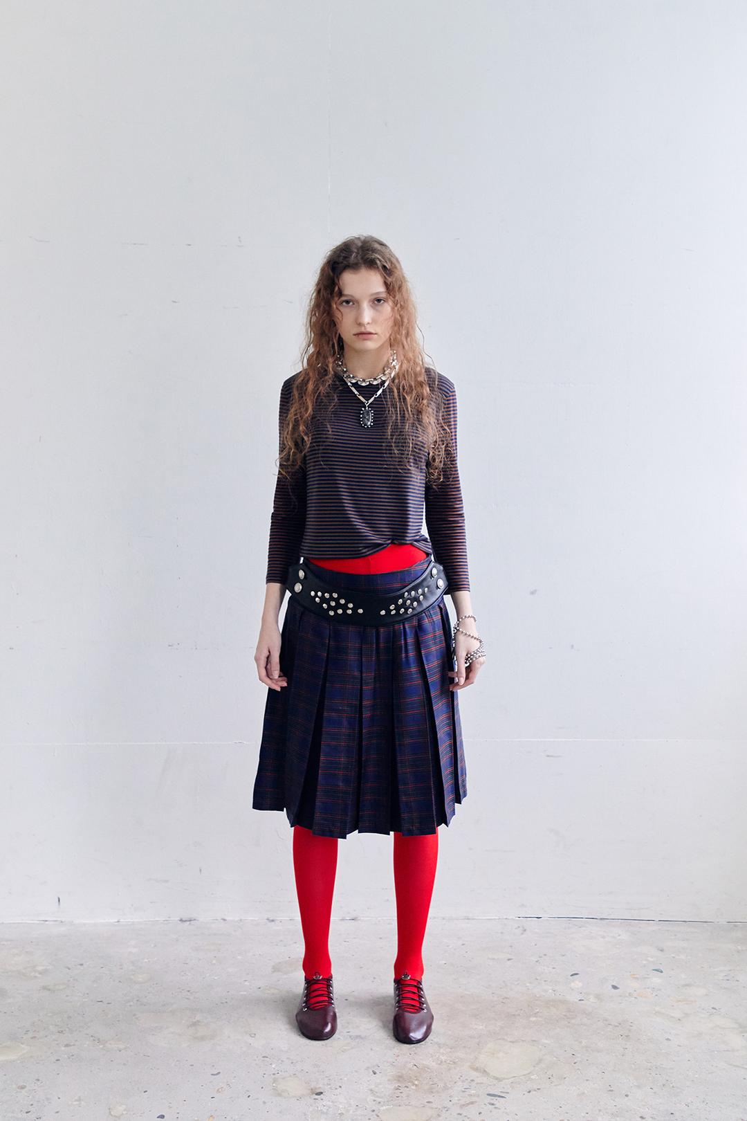 WYBIE PLEATED SKIRT IN CHECK