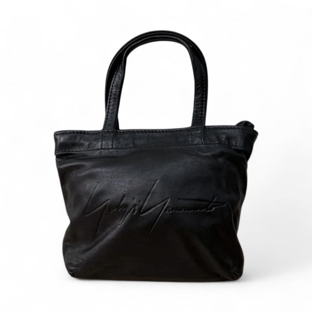 요지 야마모토 디스코드 디보싱 가죽 핸드백 | 후루츠패밀리