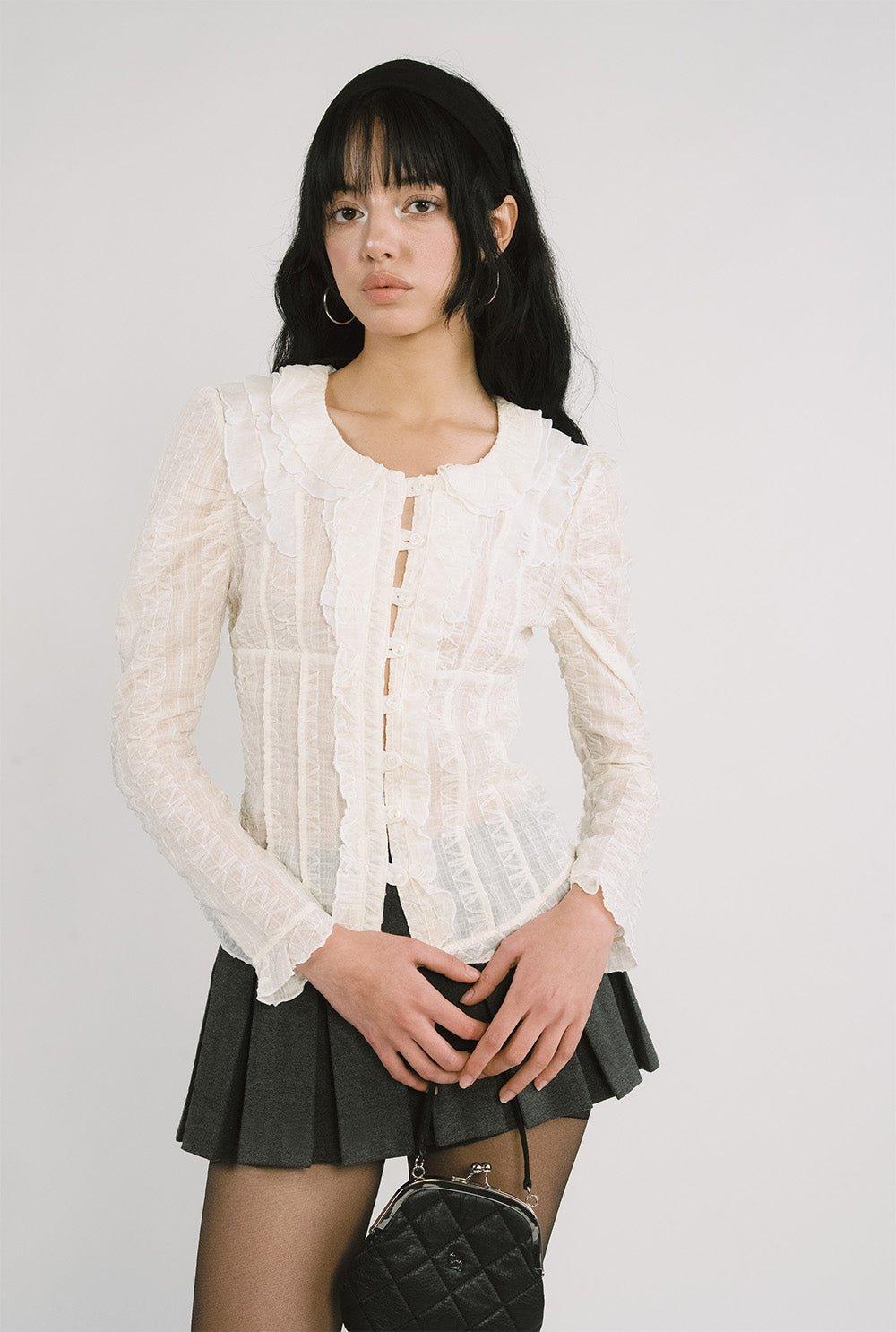 Snow ruffle top
