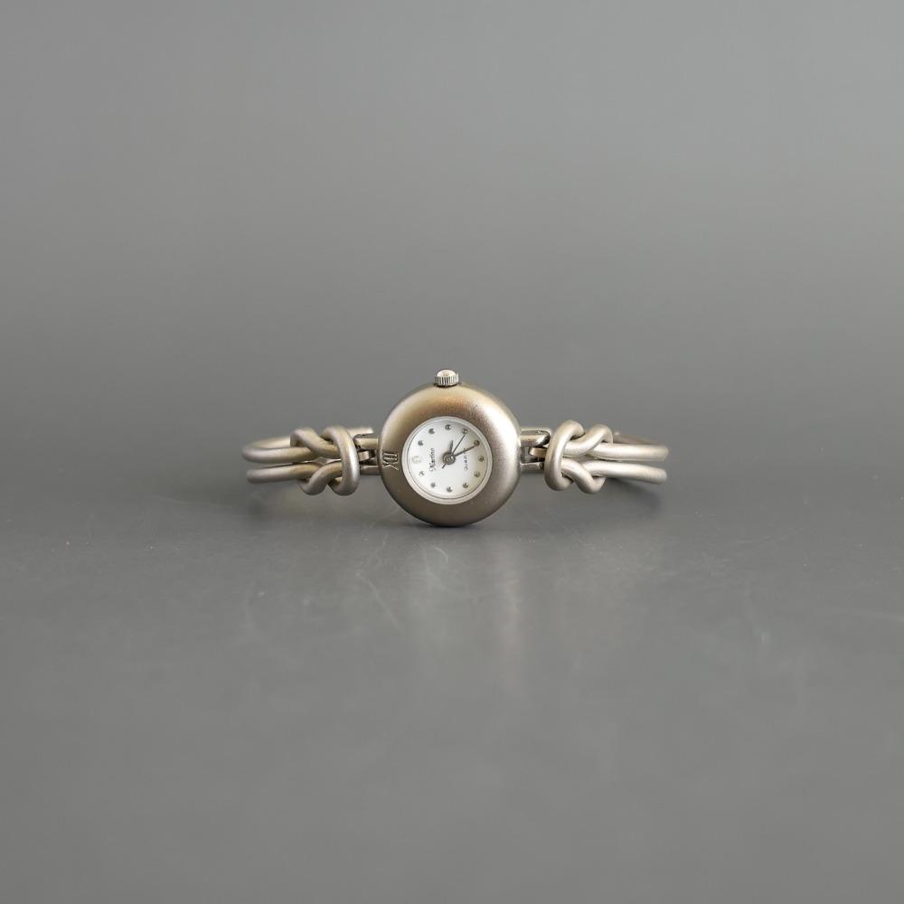 MARTINO Round antique matte bangle watch