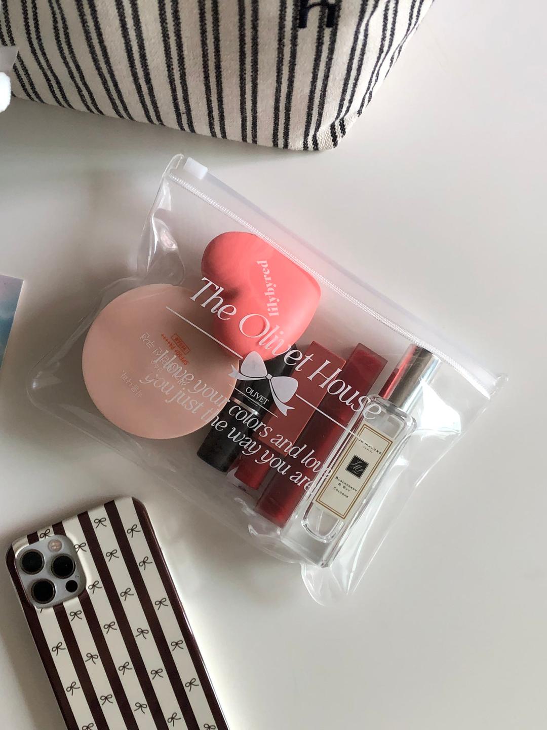 the olivet house ribbon zipper bag