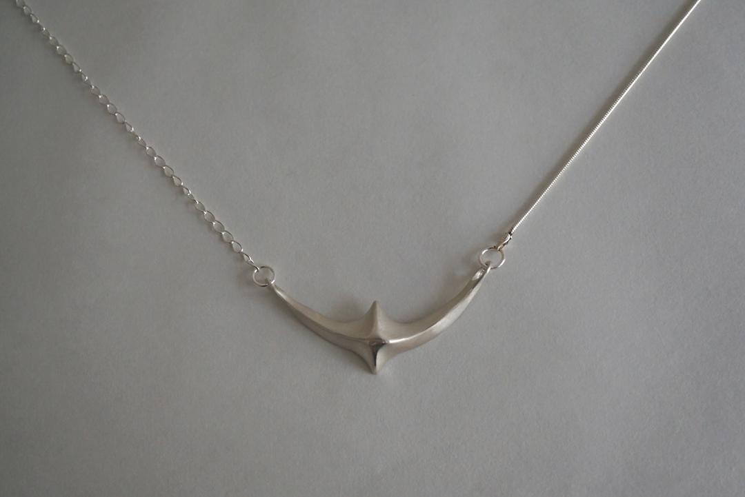 cross wing necklace