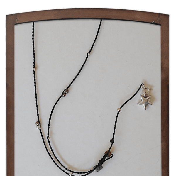 Starchild, wax necklace