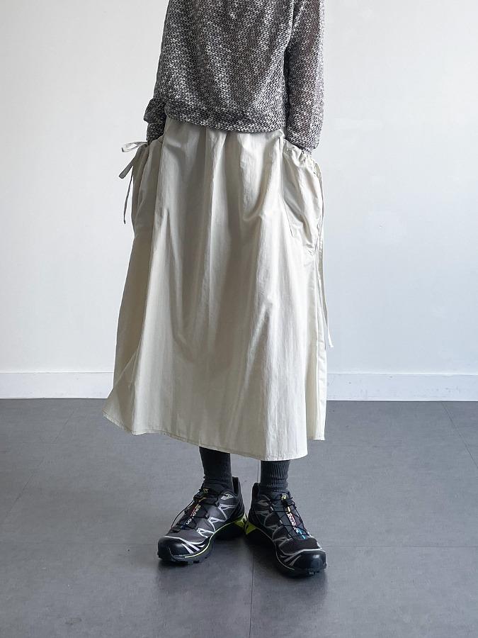 포크 셔링 플레어 롱 포켓 아웃포켓 밴딩 스커트