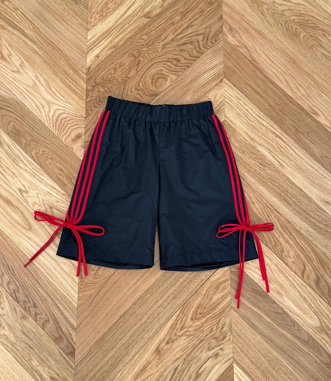 GIADA BOW/RED STRIPE NYLON SHORTS IN BLACK