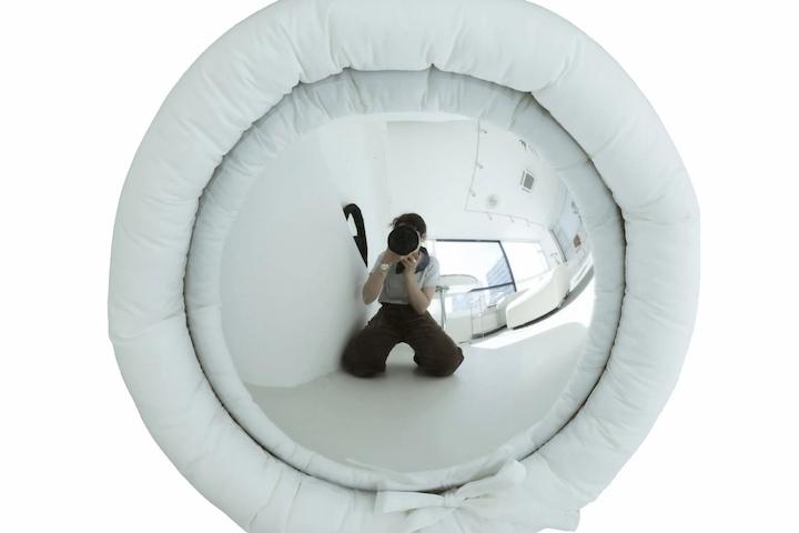 fisheye White cushion mirror