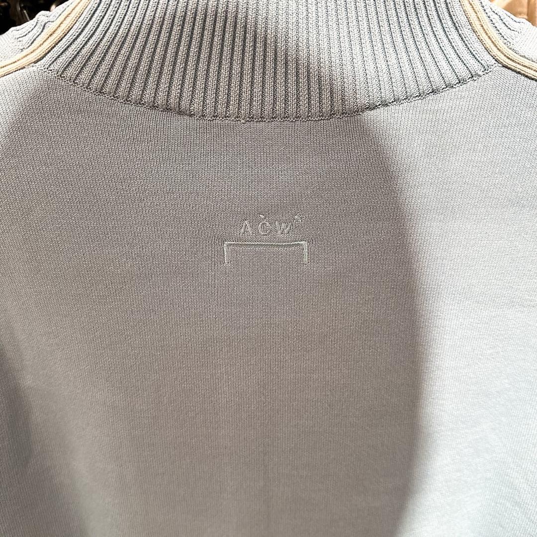 어콜드월 남성 아이보리 뱃지 로고 메쉬 테크 니트 | 후루츠패밀리