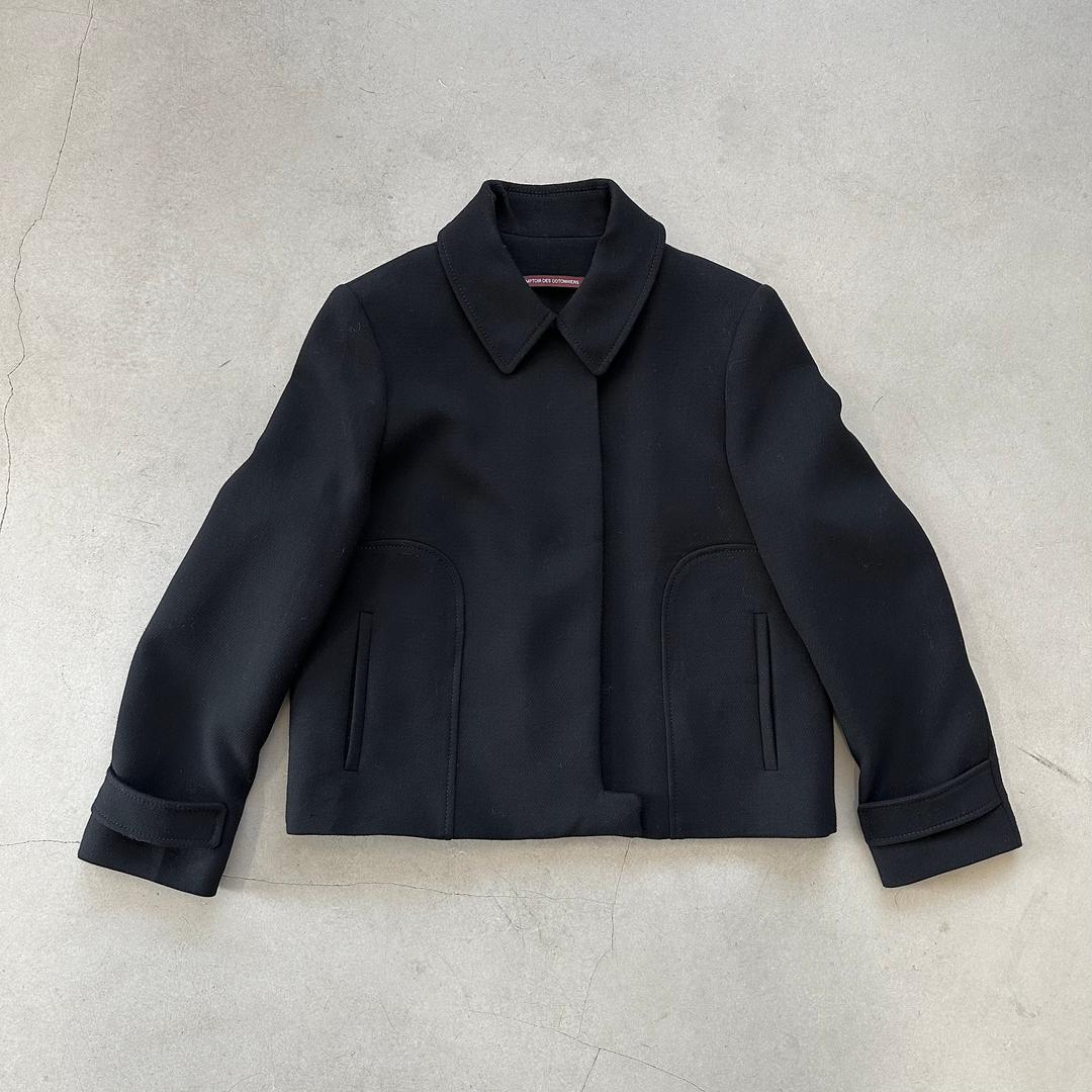 Black hidden button jacket
