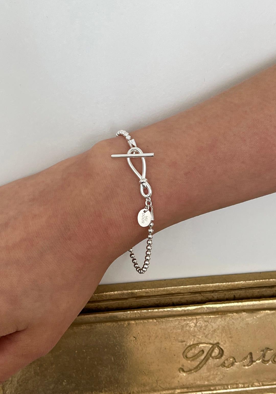 Knot toggle ball bracelet