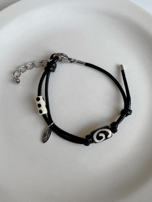 Spiral Draw Leather B.