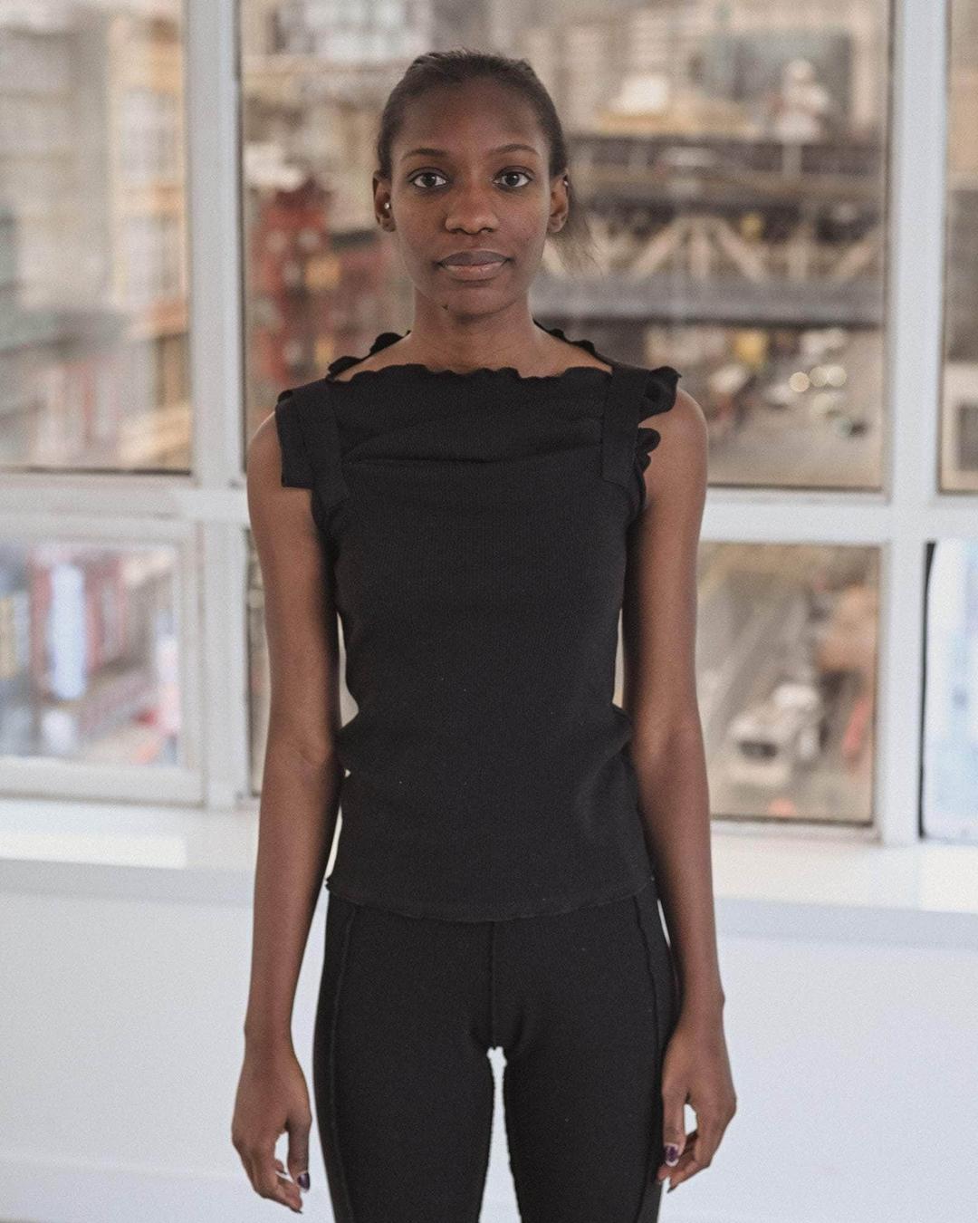 <tc>Lud</tc> 맨 위 - BLACK / XL