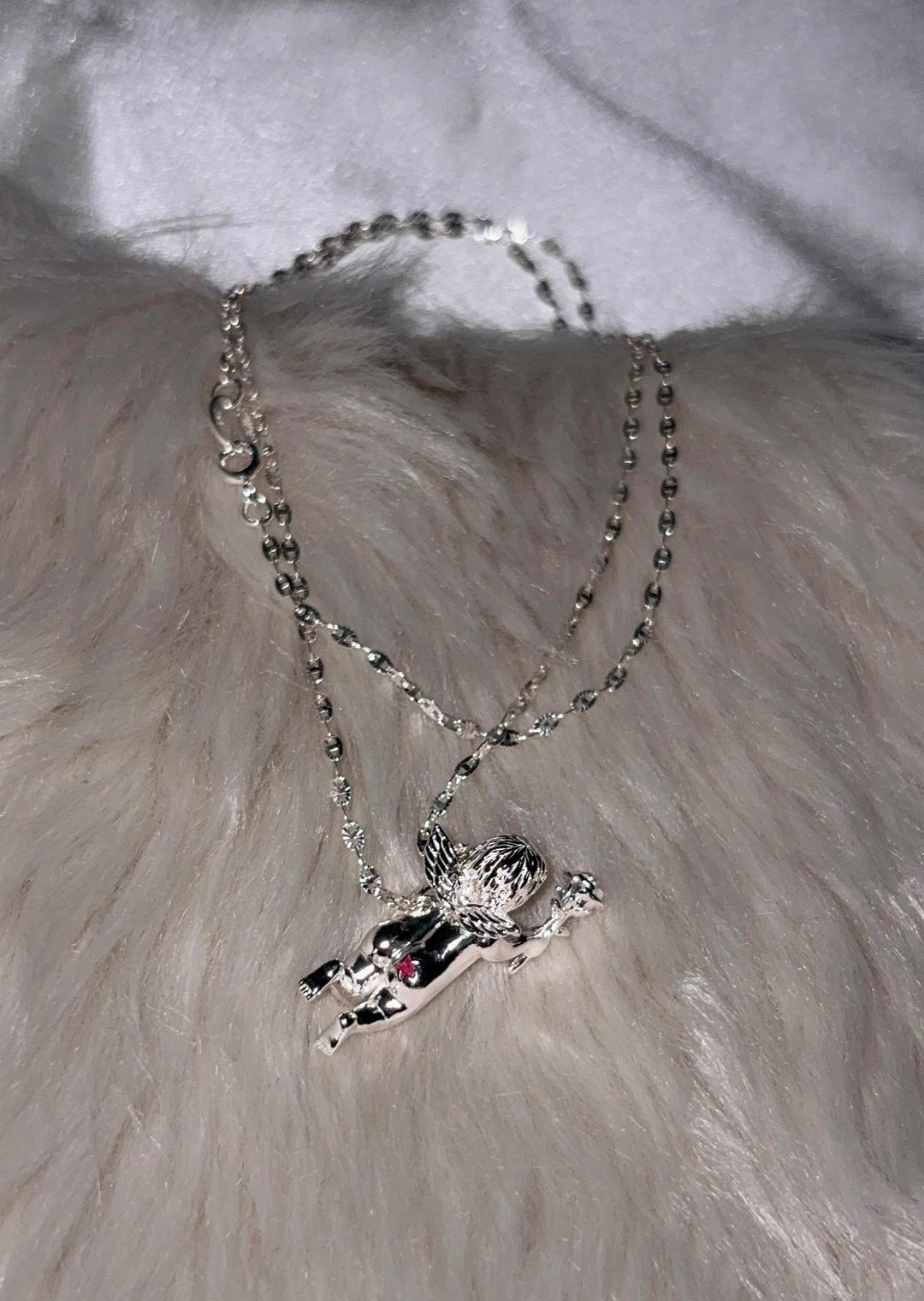 rose baby cupid necklace