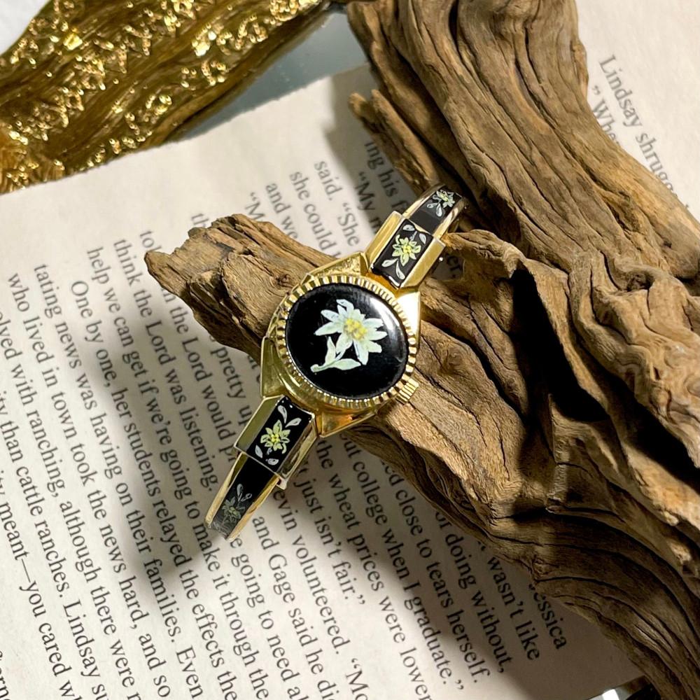 Swiss made floral cuff watch