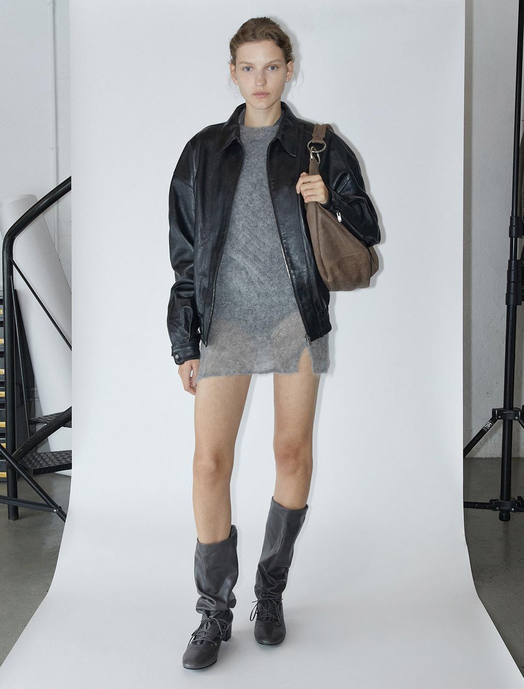 SUTIL-Grey asymmetrical sweater with a flounce.