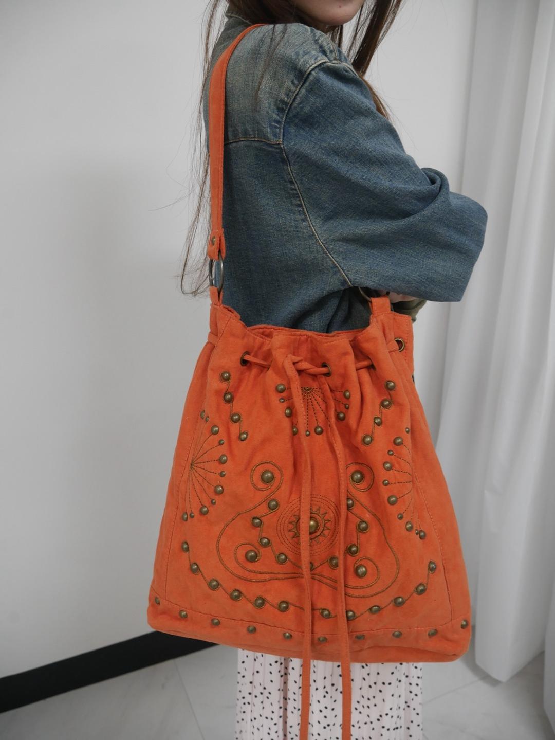 bohemian sunset stud bucket bag