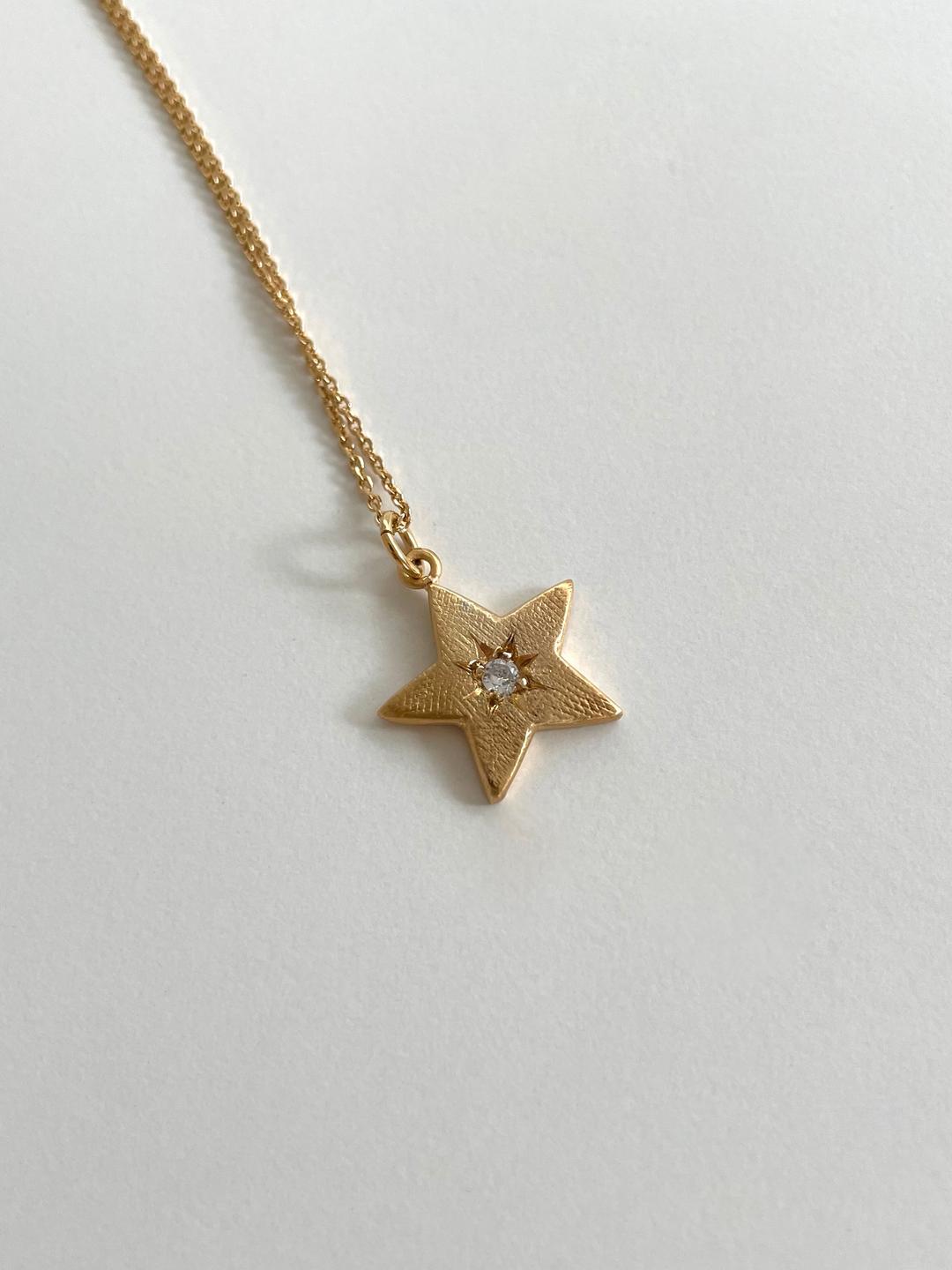 Glow star necklace gold