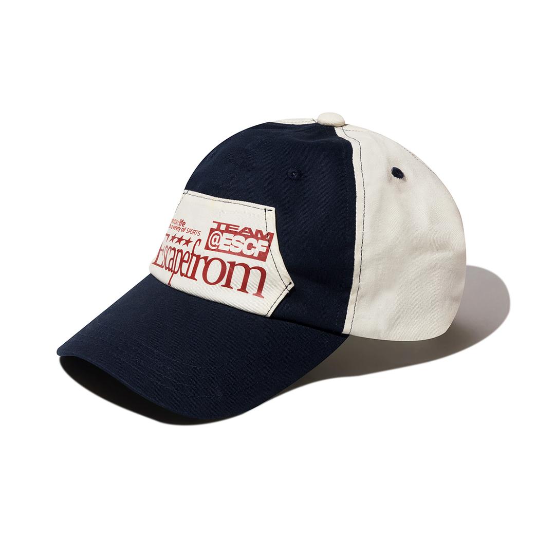 아이보리 배색 후드 포켓 ESCF 스포츠 로고 프린트 볼캡 네이비