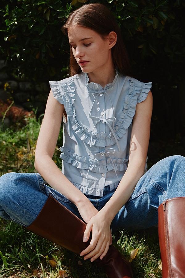 TAV SIGNATURE FRILL SLEEVELESS BLOUSE - LIGHT BLUE