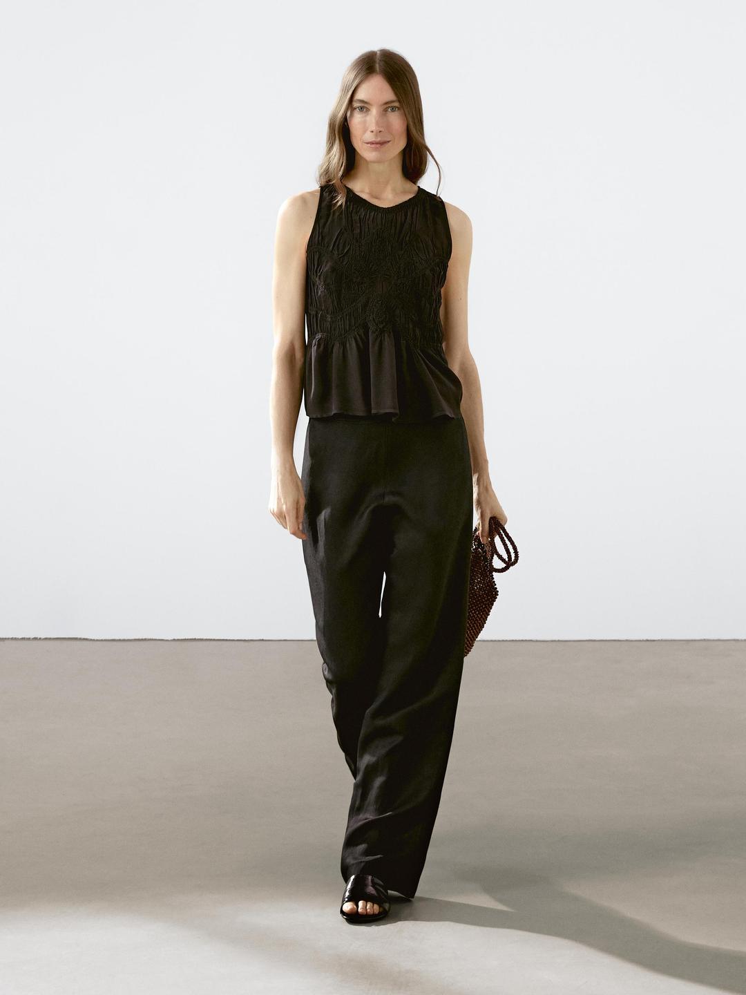Flowing halter top with gathered detail