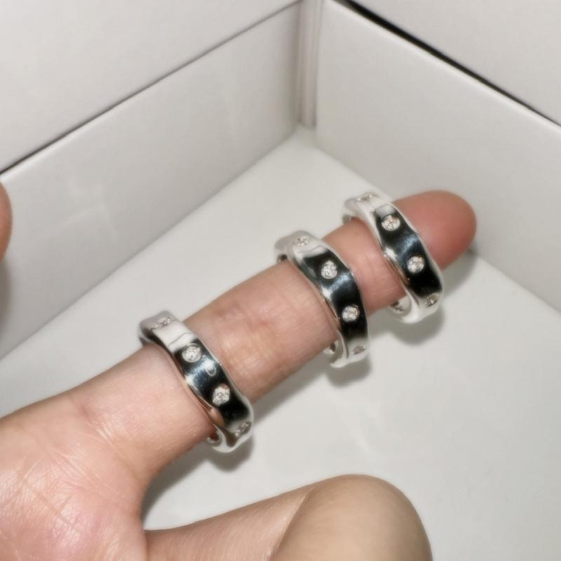 white cubic ring