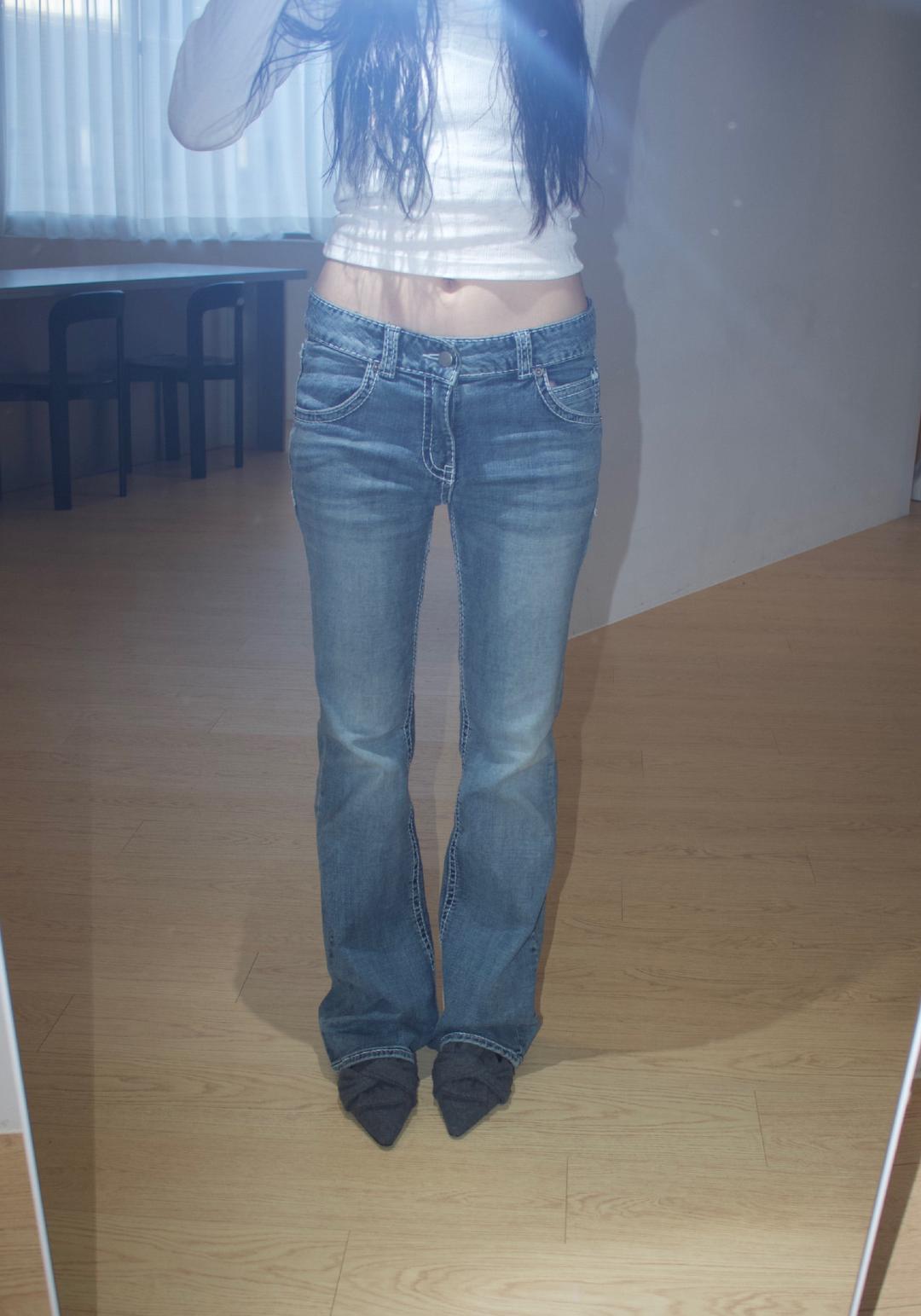 stitch washed low-rise bootcut pants