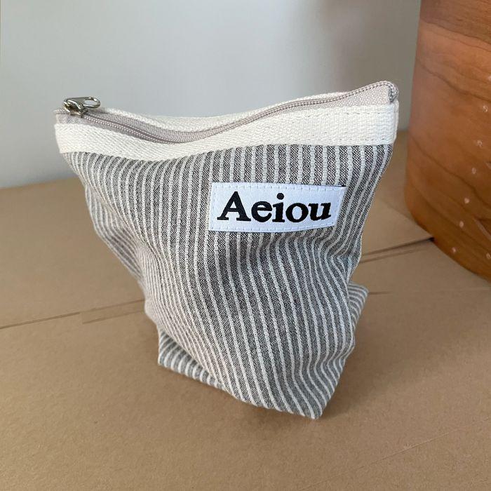 [29CM단독] Aeiou Basic Pouch (M size) Stripe Organic Ash Brown