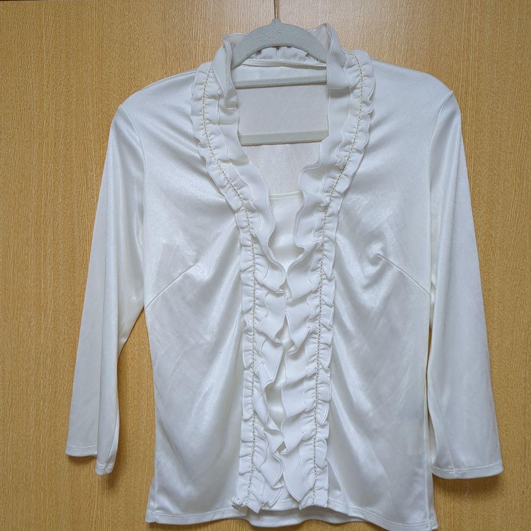 Reflectフリルブラウス