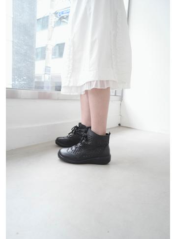 punching leather boots